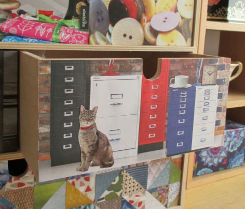 I quite liked my fifth draw, this is the draw I collect my reciepts & such like in, so using an imahe of filing cabinets seems quite appropriate & to prevent it from being too boring I have also included a cat from a flea treatment leaflet.