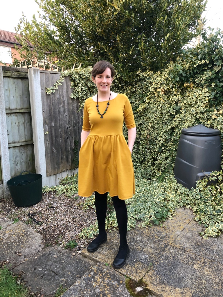 Me photographed in my garden wearing my finished Moneta dress